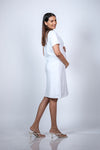 Back view of White Maternity A-Line T-Shirt Dress, featuring a breathable fabric and an easygoing fit for expectant moms.